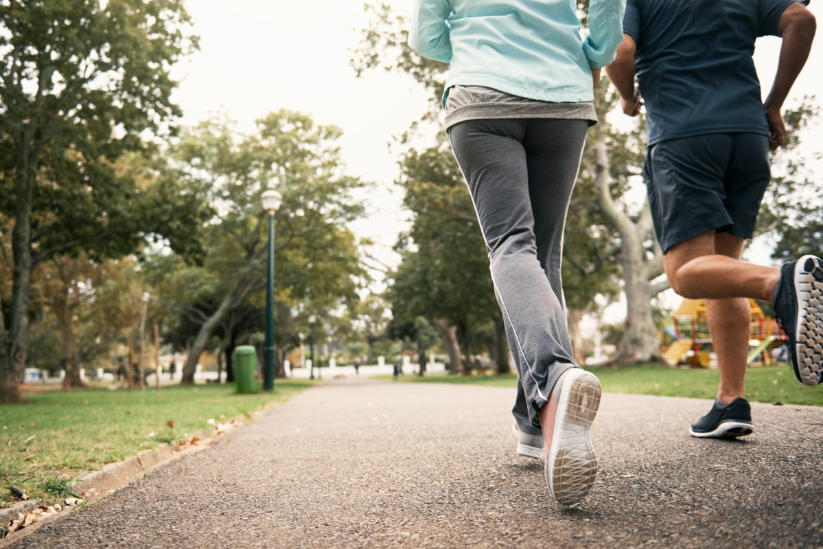 Couple jogging in park