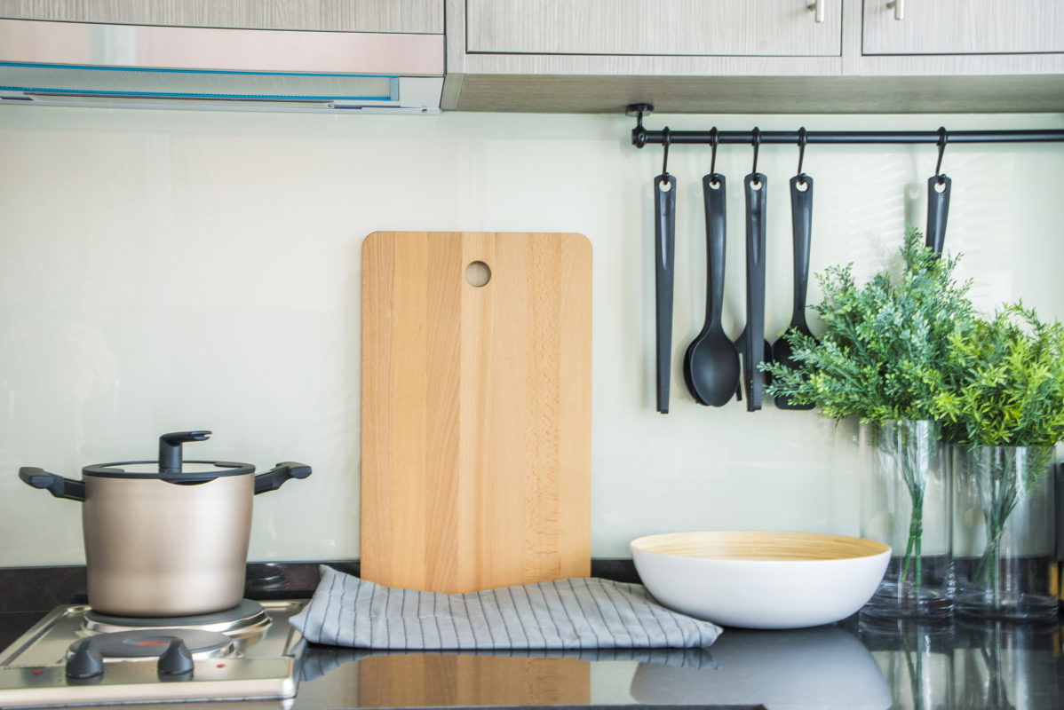 kitchen counter pot cutting board hanging utensils