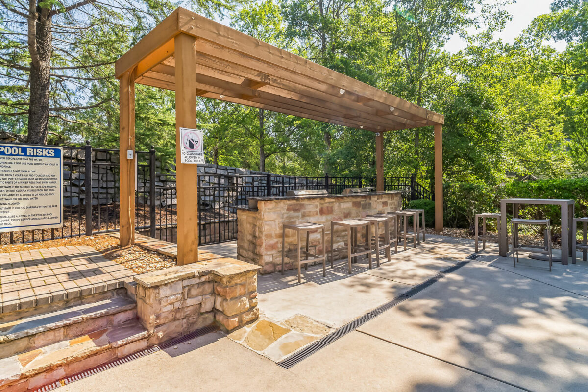 Outdoor recreation area with tall stools